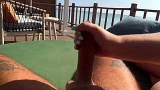 Hot Babe Gives Fast And Sloppy Handjob On The Terrace Over The Ocean