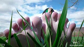 Goddess Feet In Cute White Socks On Spring Grass Field