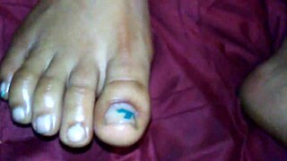 ebony girl gives intense footjob with cumshot