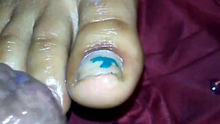 ebony girl gives intense footjob with cumshot