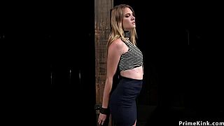 blonde shackled to column with neck and hands bound