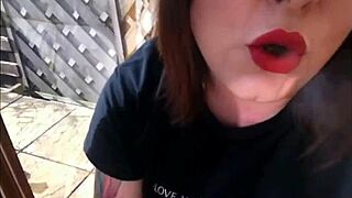 Tina snua smokes a cork cigarette.