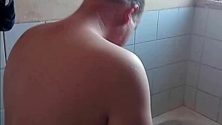 Grandpa and daddy enjoy amazing bathroom blowjob sex