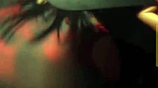 In the night club, a stunning brunette bombshell shakes her huge ass while dancing seductively.