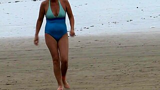 I couldn't resist any longer. On the beach, my stepson fucked me and came inside.