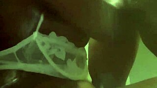 I'm sucking a big black cock in front of the fridge, choking and gagging on it.