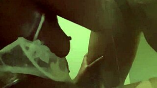 I'm sucking a big black cock in front of the fridge, choking and gagging on it.