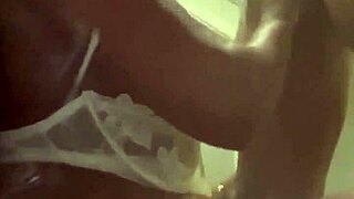 I'm sucking a big black cock in front of the fridge, choking and gagging on it.