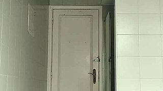 Guy in Black Beach Shorts Shaving on the Beach