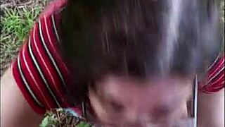 Nasty white slut eagerly sucks big black cock outdoors in interracial encounter