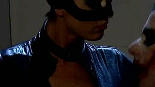 catwoman gets into a wild threesome inside the cage