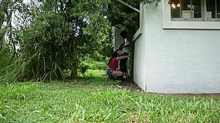 Nasty white slut eagerly sucks big black cock outdoors in interracial encounter