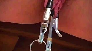 big pink pussy lips dangled and stretched with weights