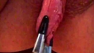 big pink pussy lips dangled and stretched with weights