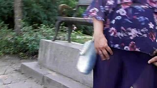 Hairy mature woman flashes in pants at public park