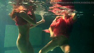 lilia mihalkova and natalia kupalka splashing in the pool with hot underwater lesbian action 😍