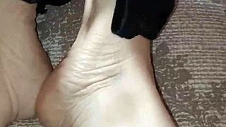 Gretala rubs thong on bare feet intensely