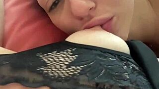 She teases my huge clit whiel sucking my erect nipples.