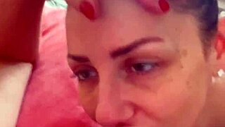 She teases my huge clit whiel sucking my erect nipples.