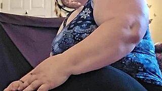 Bbw performs stretching and mild yoga in a homemade session