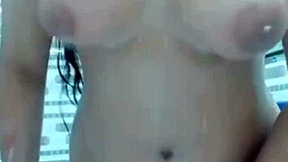 Pakistani Stepmom Teases with Dildo in Bathroom