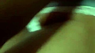 Beautiful Woman Poses on Bed Edge in White Bra with Huge Buttocks