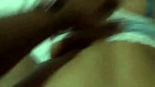 Beautiful Woman Poses on Bed Edge in White Bra with Huge Buttocks