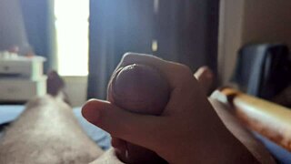 Solo homemade closeup monster cock strokes in sunlit bedroom rays