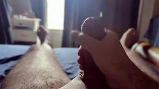 Solo homemade closeup monster cock strokes in sunlit bedroom rays