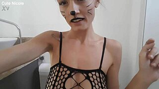 cute skinny girl with small tits does body painting fetish in bathroom