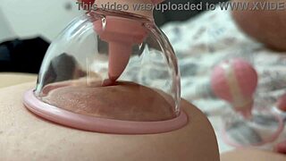 Watch her play teasing games with massive milky natural tits up close first time