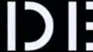 Fernanda Ferrari poses in red mini skirt