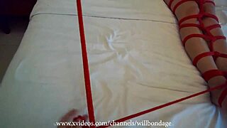 sofi tied in red ropes on bed wants your cock now?