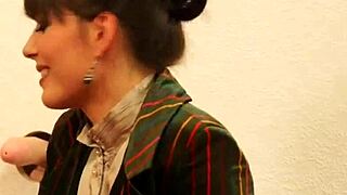 gloryhole lesbian slurps cum-drenched pussy under femdom strapon command