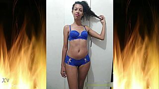 Feel the tease as beautiful brunette slips into blue lingerie for intimate reveal