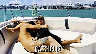 Latina rides tattooed cock on boat till creampie fills her