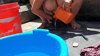 village bhabhi bathes outdoors flashing big tits ass and wet pussy for lick