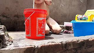 village bhabhi bathes outdoors flashing big tits ass and wet pussy for lick