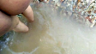 stepmom by the river in jungle waits for outdoor thrill while husband watches her bent over assfucking