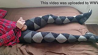 Shemale in Plaid Dress Jerks Monster Cock in Argyle Tights While Crossdressing