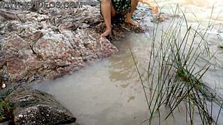 stepmom by the river in jungle waits for outdoor thrill while husband watches her bent over assfucking