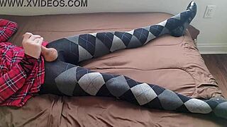 Shemale in Plaid Dress Jerks Monster Cock in Argyle Tights While Crossdressing