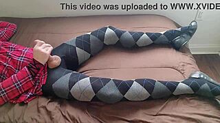 Shemale in Plaid Dress Jerks Monster Cock in Argyle Tights While Crossdressing