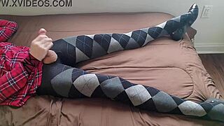 Shemale in Plaid Dress Jerks Monster Cock in Argyle Tights While Crossdressing