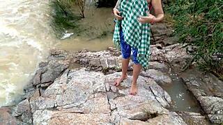 stepmom by the river in jungle waits for outdoor thrill while husband watches her bent over assfucking