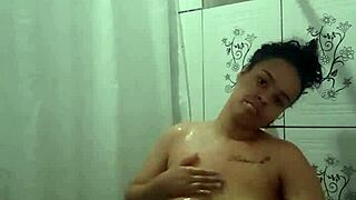 brunette latina teen fingers pussy orgasming in shower