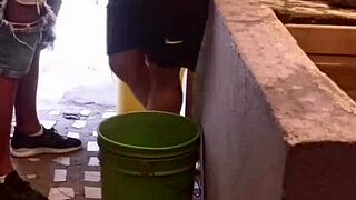 Friend sneaks anal creampie in ass while she washes clothes