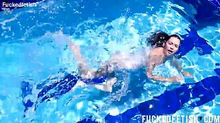 yessica bunny's shaved pussy glistens wet underwater with small tits bouncing