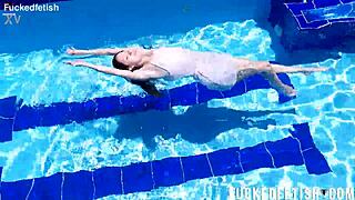 yessica bunny's shaved pussy glistens wet underwater with small tits bouncing