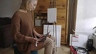 hey check out this cute blonde painting her pretty pussy flower